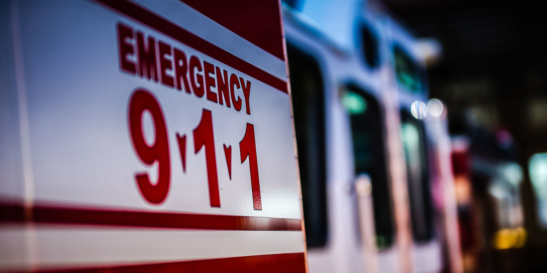 Close up of 911 written on a ambulance 