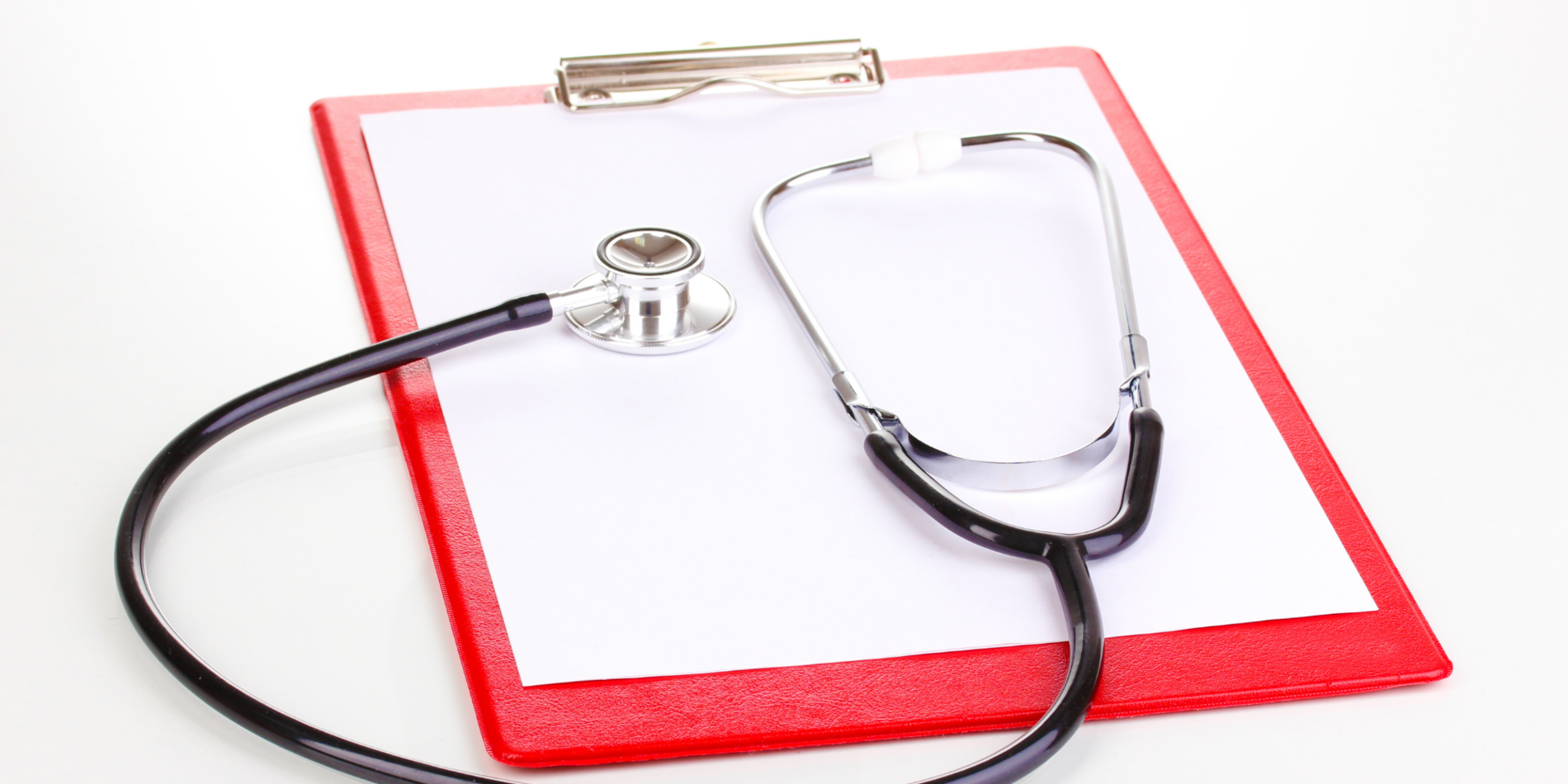 Red clipboard with stethoscope on top
