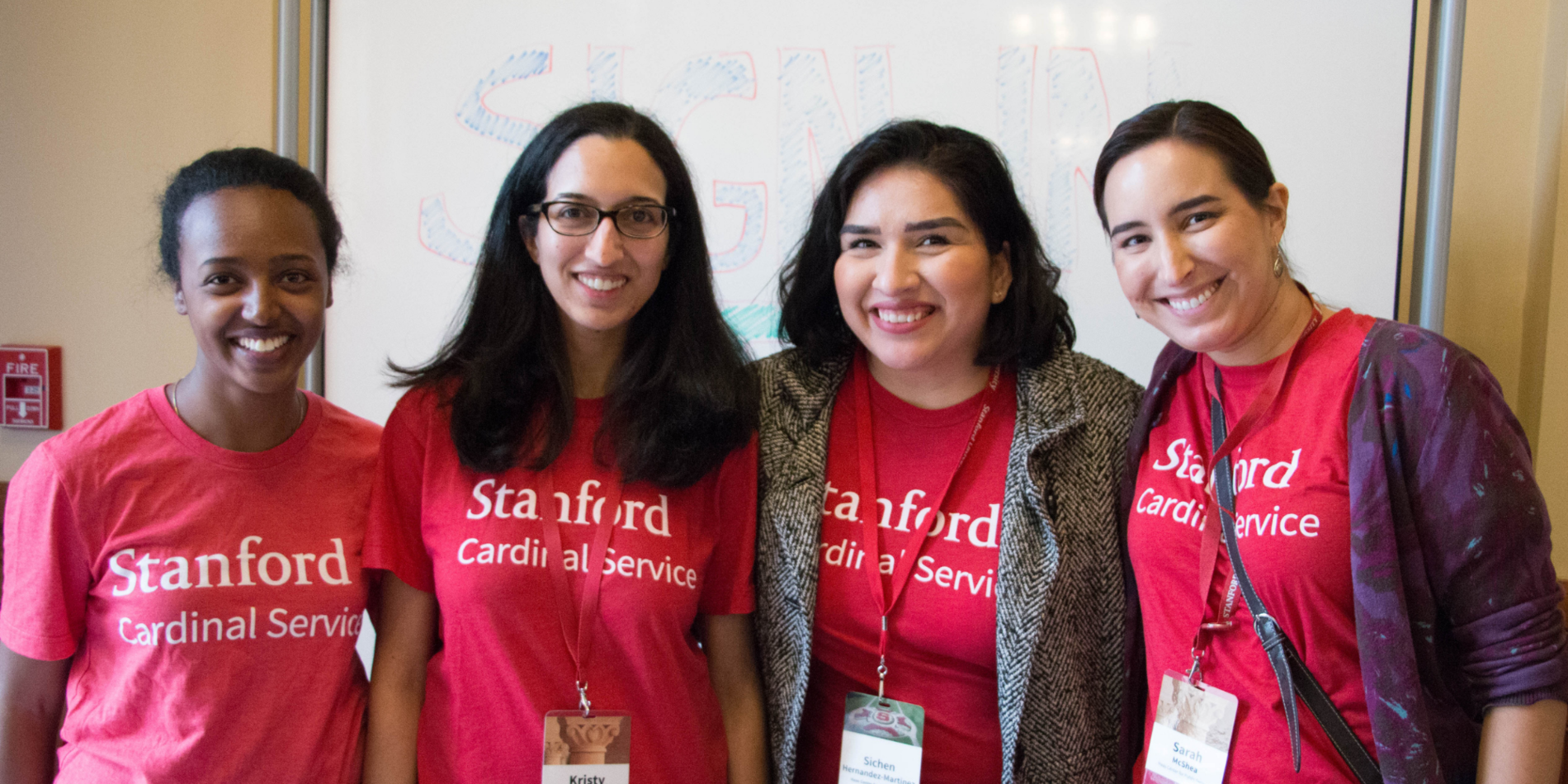 Group of female Stanford students at a volunteer opportunities fair