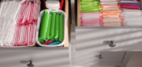 Open drawers with rows of menstrual products in bright colors